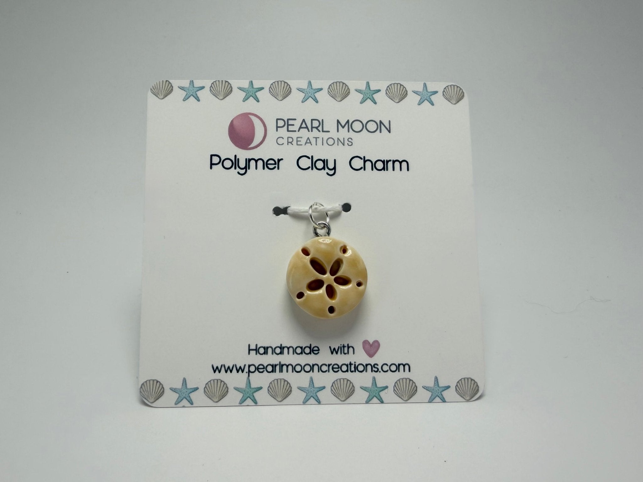 Sand dollar charm - Pearl Moon Creations