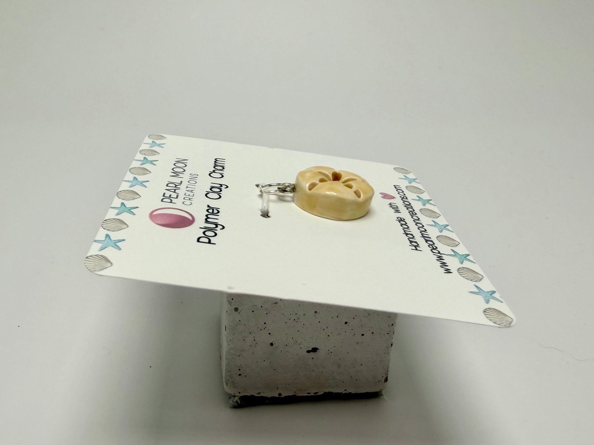 Sand dollar charm - Pearl Moon Creations